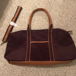 Maroon Corduroy duffle with side strap never used